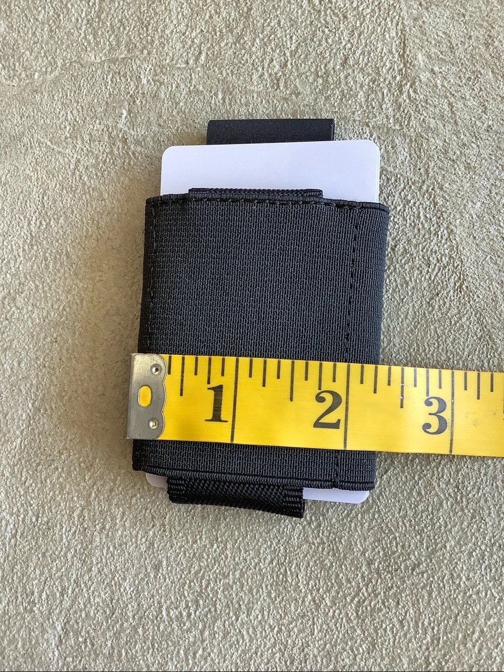 Nomatic black elastic wallet